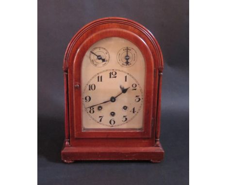German Eight Day Striking Mantle Clock by Mauthe.  Arched Wood Case.  34cm tall. 