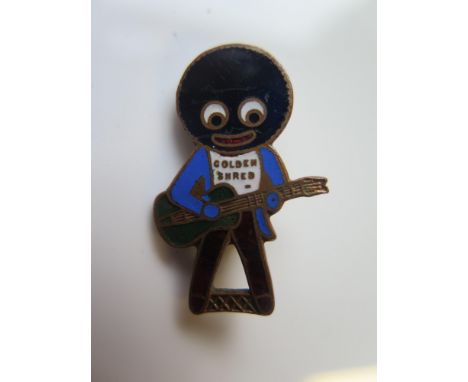 A Robertson's Golly Playing Guitar Brooch by H.W. Miller Ltd.