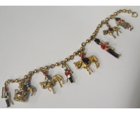 A 9ct Gold and Enamel Royalist Charm Bracelet including The Queen, Guards and Crown, 39.5g 