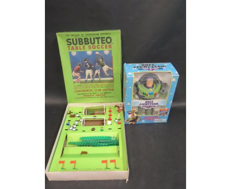 A Subbuteo Table Soccer Game and Buzz Lightyear Figure 