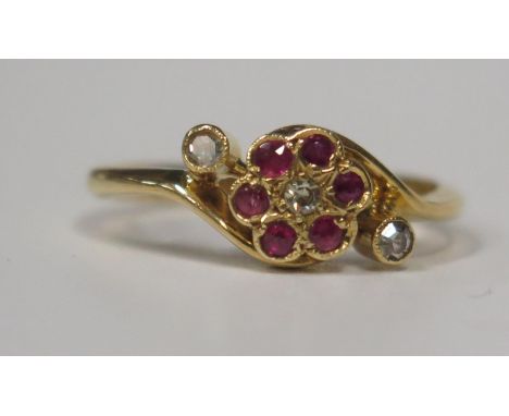 An 18ct Gold and Diamond Crossover Cluster Ring, 12mm diamond to diamond, size K, 2.6g 