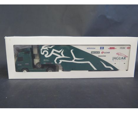 An Eligor 111847 Volvo FH12 Jaguar F1 Team Transporter 1/43 Scale. Model has loose mudguard and sideskirt 