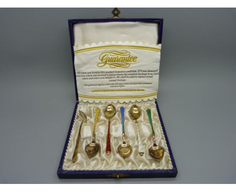 A cased set of six silver gilt and enamel coffee spoons, marked Ela, Denmark