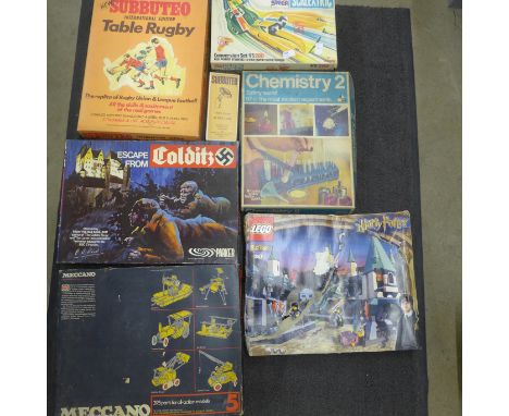 A collection of vintage games including a Subbuteo Table Rugby, Scalextric, Chemistry Set, Meccano set, Lego, etc.