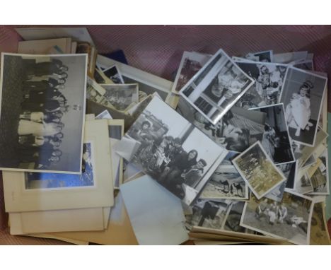 A suitcase containing a collection of vintage photographs 