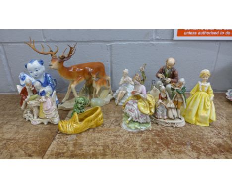 A collection of porcelain figurines including Royal Worcester and a jade bird, some a/f **PLEASE NOTE THIS LOT IS NOT ELIGIBL