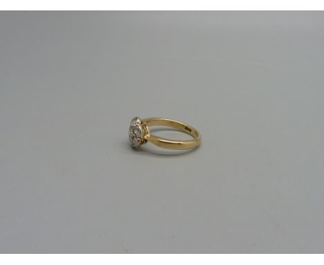An 18ct gold and diamond cluster ring, 3.5g, L, in vintage box 