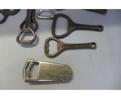 Approximately fifty vintage advertising bottle openers 