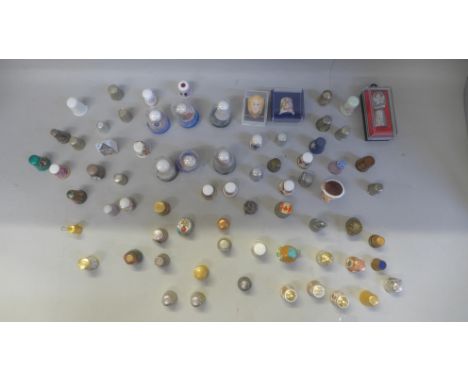 A box of enamel and other thimbles 