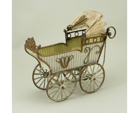 A rare Marklin embossed tinplate pram doll carriage, German circa 1900, hand painted cream embossed wicker style carriage wit