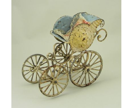 A Marklin embossed tinplate Stroller, German circa 1900, hand painted in cream with light blue padded effect seat, embossed c