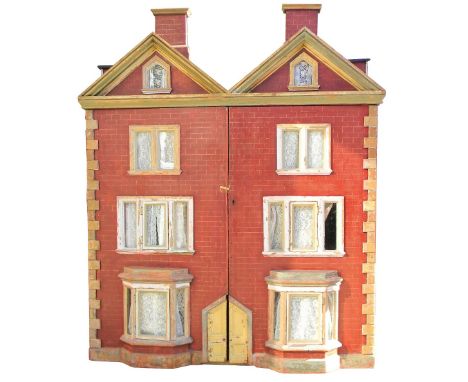 ‘Glebe House’ a large and impressive painted wooden dolls house with contents, English, mid nineteenth century, the three sto