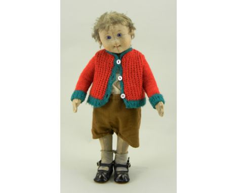 Steiff felt boy doll, German circa 1910, with two stitched seams to face, blue glass eyes, and short brown hair, swivel head 