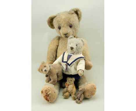 Steiff Original Teddy bear, German 1950s, straw filled brown mohair bear with brown glass eyes, stitched nose, mouth and claw