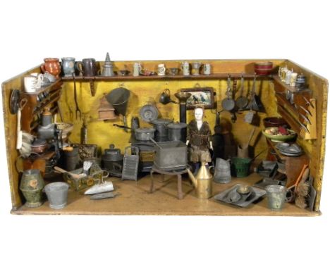 A rare miniature Nuremberg Kitchen room set, German mid 19th century, the pine walls with remains of original yellow stain, w