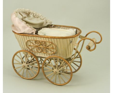 A rare Marklin embossed tinplate pram doll carriage, German circa 1900, hand painted cream embossed wicker style basket shape