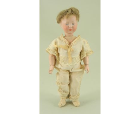 Small Kammer &amp; Reinhardt 101 bisque head character doll, German circa 1909, the pale bisque head with painted pale blue e