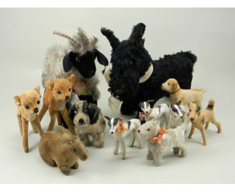 Early Steiff velvet rabbit, German circa 1909, the cream and brown bunny with black glass eyes, red stitched nose and mouth a