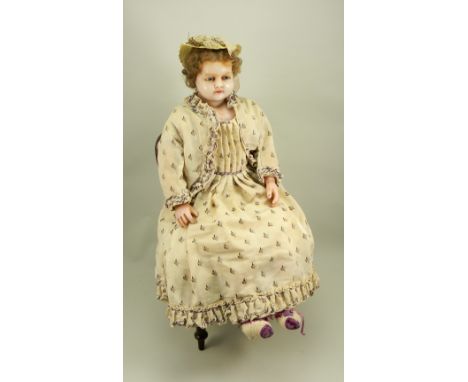 Large early English poured wax shoulder head doll, circa 1860, with fixed blue glass eyes, moulded lids, painted light brown 