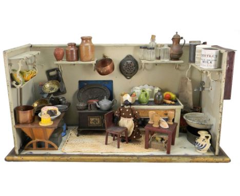 Early German dolls tin-plate kitchen room set, German 1880s, with painted brown wood effect exterior, gold painted base, and 