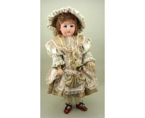 Large Max Handwerck 133 bisque head doll, German circa 1910, with weighted blue glass eyes, painted lashes and raised brows, 