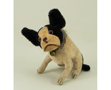 A Steiff mohair seated Bully Bulldog, circa 1930, with black and white mohair, brown glass eyes, velvet muzzle with stitched 