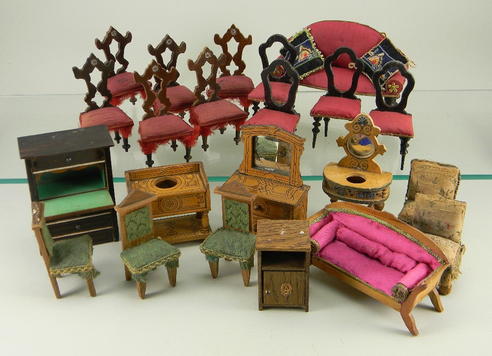 Selection of German dolls house furniture, 1890s1900s, including red