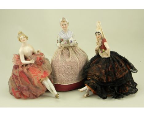 Three pin-cushion half dolls, German early 20th century, including W Goebel  ‘Chocolate lady’ with finely painted features, m
