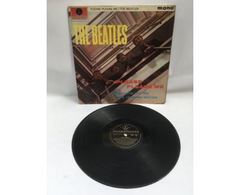 An early pressing of The Beatles debut LP 'Please Please Me' in Mono with black and gold Parlophone labels, XEX 421-1 N stamp