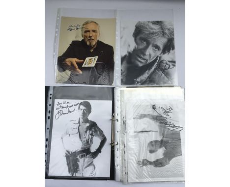 A binder containing various signed publicity prints and magazine covers of film stars including John Hurt, Peter O'Toole, Den