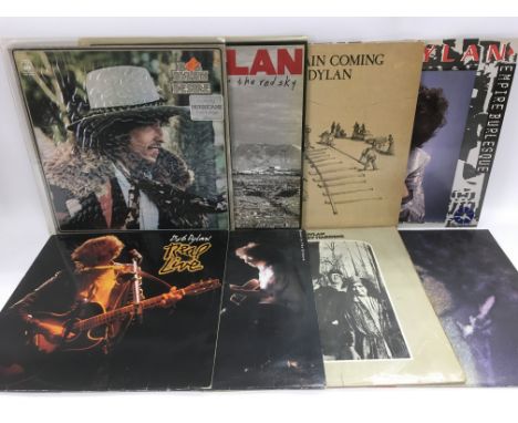 Eight Bob Dylan LPs comprising 'Slow Train Coming', 'Desire', 'John Wesley Harding' and others.