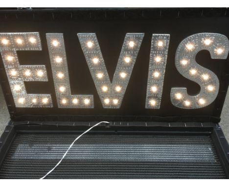 A light up illuminated 'Elvis' sign, approx 60cm x 30cm.