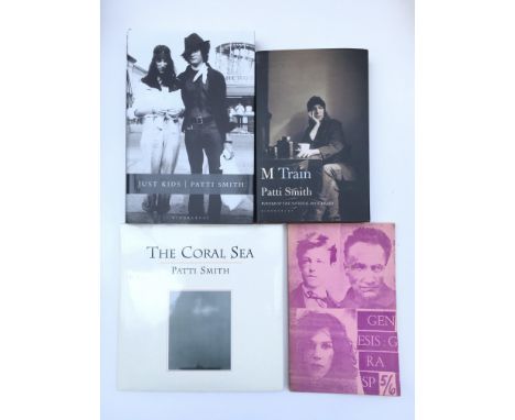 A signed hardback copy of The Coral Sea by Patti Smith, autograph to the title page, alongside Just Kids and M Train, as well