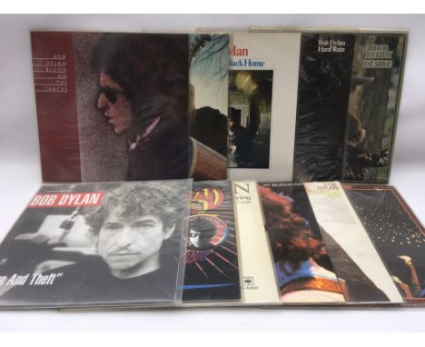 A collection of Bob Dylan LPs.