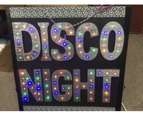 A light up illuminated 'Disco Night ' sign, approx 61cm x 61cm.