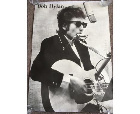 A collection of various music posters including Bob Dylan, Kylie Minogue, a signed Bill Legend, Tom Verlaine and others.