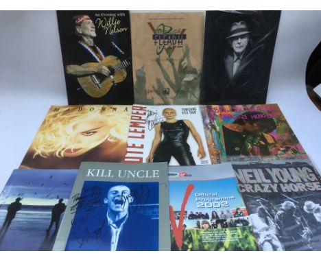 A collection of various tour programs including a signed Morrissey brochure (sadly not signed by the man himself but contains
