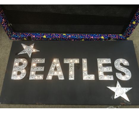 A light up illuminated 'Beatles' sign, approx 60cm x 30cm.