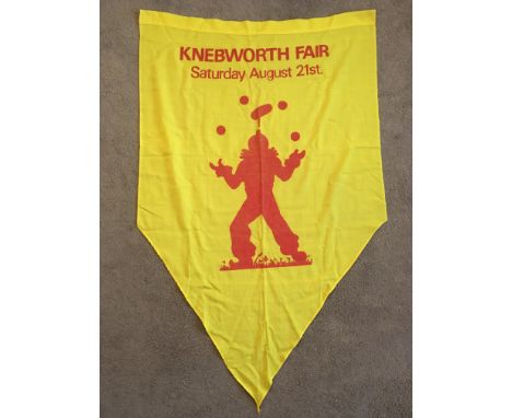 An original concert flag from The Rolling Stones Knebworth Fair concert in 1976, approx 135cm x 86cm, together with a circula