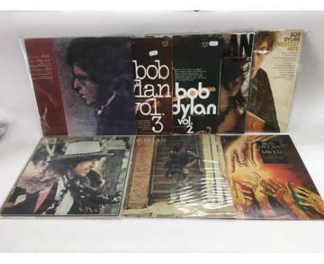 Eight Bob Dylan LPs comprising 'Desire', 'Blood On The Tracks', 'Street Legal' and others. Condition fair to VG.