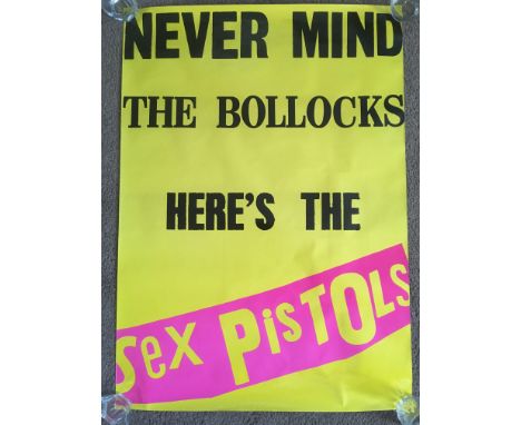 A Sex Pistols 'Never Mind The Bollocks' poster, approx 64cm x 90cm. Rolled and in a good condition, some light staining (see 
