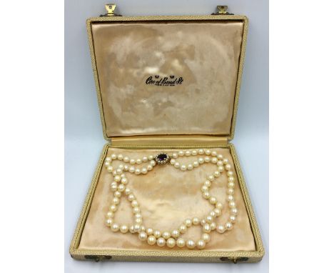 2 string pearl necklace with amethyst &amp; pearl clasp stamped DHJ marked 375 in original cased box Ciro of Bond Street 