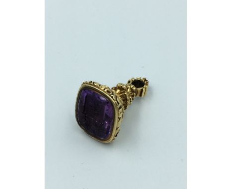 Early Victorian amethyst &amp; unmarked yellow metal fob seal, amethyst plaque bearing coat of arms (rampant horse topped by 