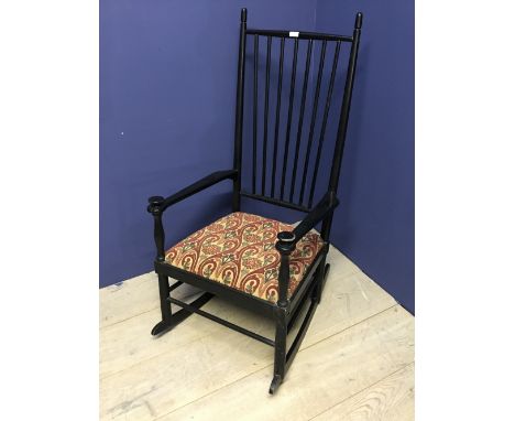 High ladder back rocking chair in black with upholstered seat 