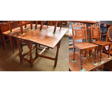 18th Century Oak Gate Leg Table, 122cm by 106cm by 71cm and a pair of Victorian mahogany hall chairs (3)