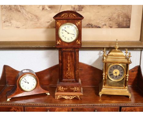 A French Brass Striking Mantel Clock, retailed by Miller &amp; Son, London, twin barrel movement striking on a gong, 31cm hig