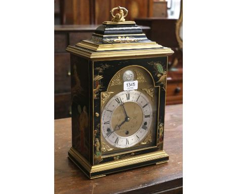A Chinoiserie Chiming Table Clock, 20th century, signed Elliot, case with top carrying handle, decorated with figures, flower