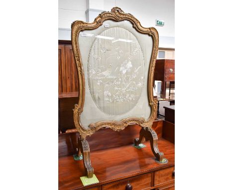 A 19th Century Gilt Framed Damask Fire Screen, decorated with birds and blossoms, 65cm by 107cm