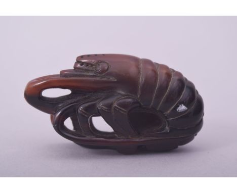 A FINE JAPANESE CARVED HORN NETSUKE OF A LOBSTER, possibly rhino horn, 6cm long.