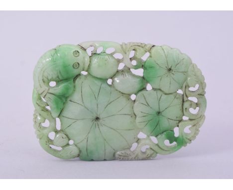 A CHINESE CARVED AND PIERCED JADE / JADEITE AMULET, with carp and lily pads, 9cm x 6cm.